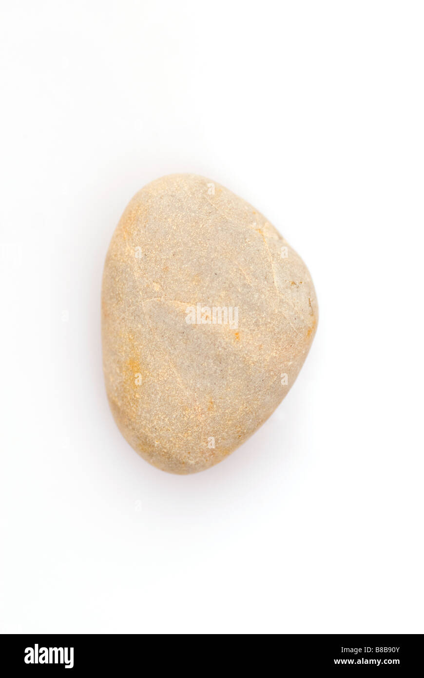 Single pebble stone cutout on a white background Stock Photo