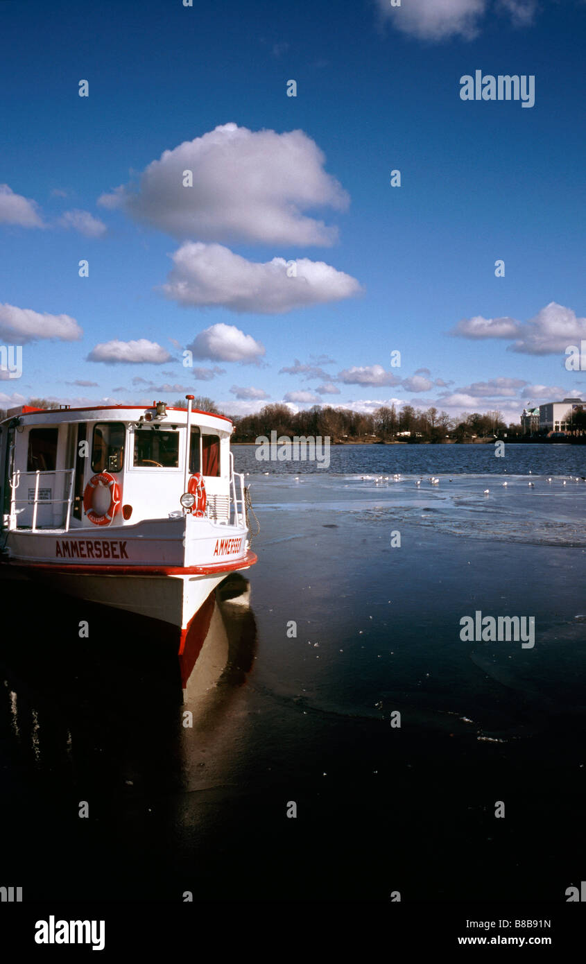 Feb 17, 2009 - Alster steamboat Ammersbek moored at Jungerfernstieg pier on the Inner Alster in the German city of Hamburg. Stock Photo