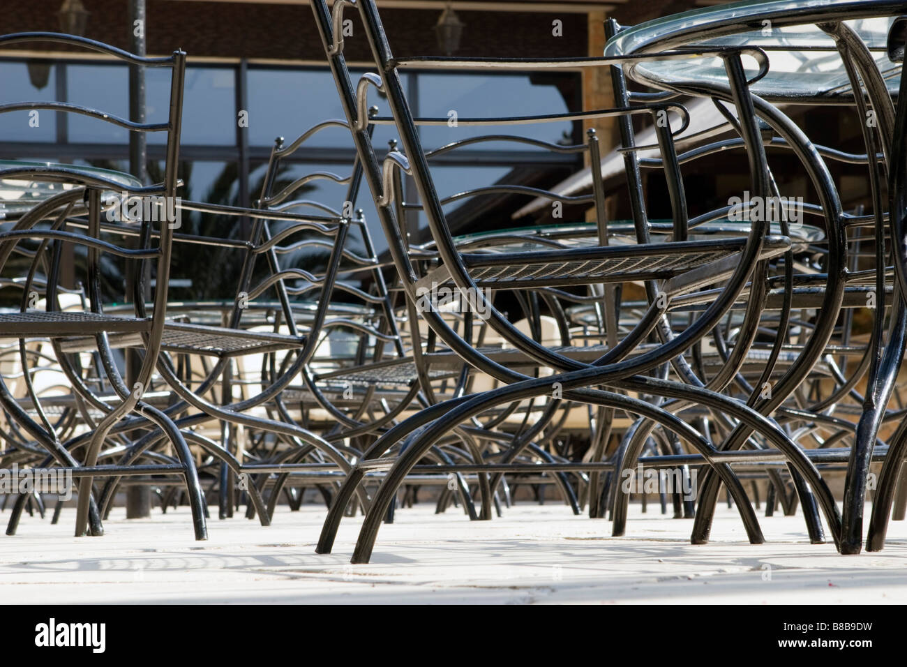 Cafe metal chairs composition Stock Photo - Alamy