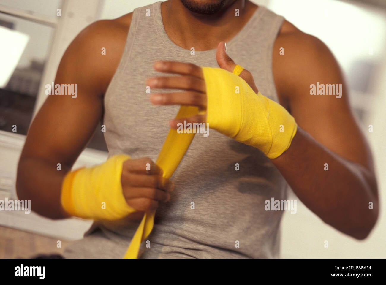 Boxer wrapping his hands Stock Photo Alamy