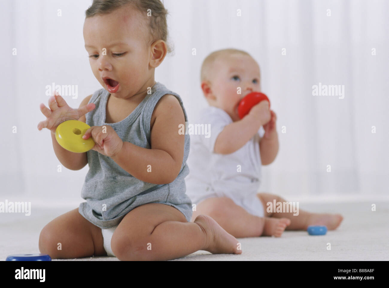Two 6 Month Old Babies Playing Stock Photo Alamy