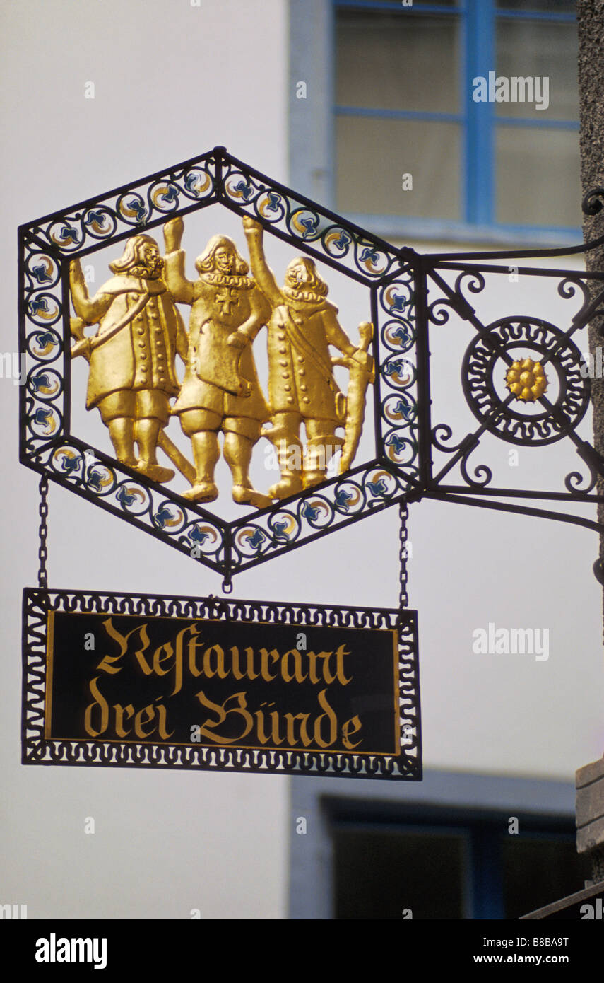 Drei Bünde Restaurant sign near St Martin Church in Gruyeres in ...