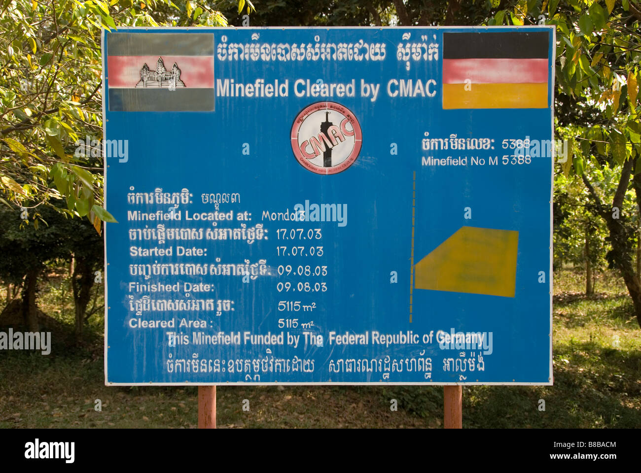 Minefield clearance sign between temple sites at Angkor Wat, Cambodia Stock Photo