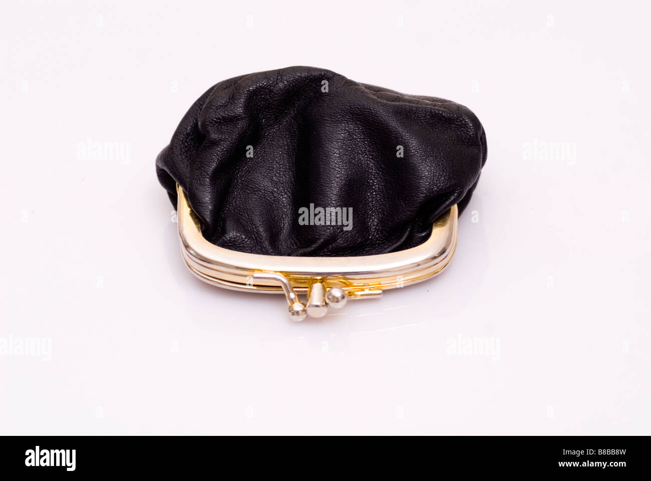 Small black purse on a white background Stock Photo - Alamy