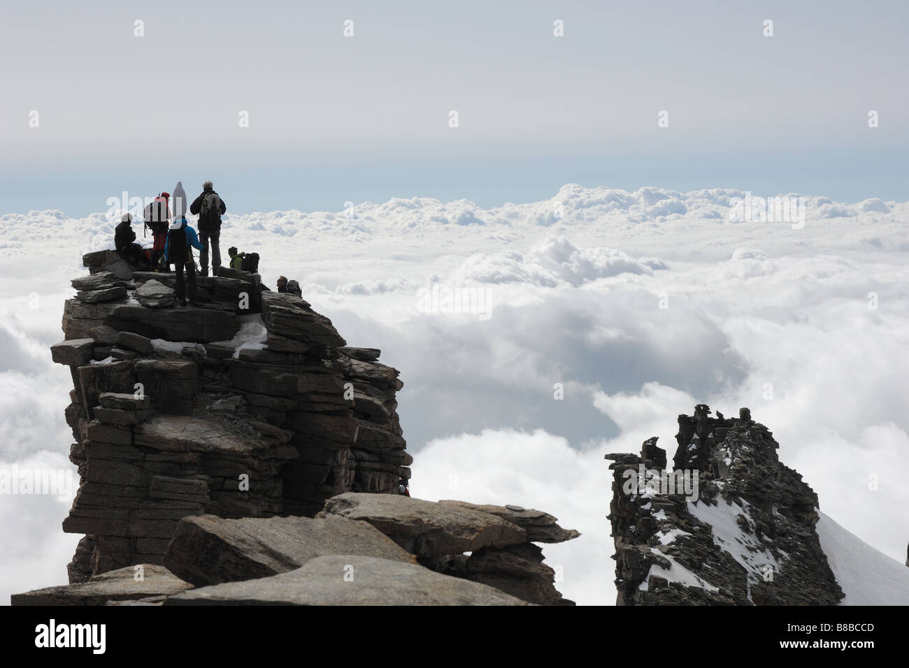 Gran Paradiso top clouds climbing 4060 mt Stock Photo