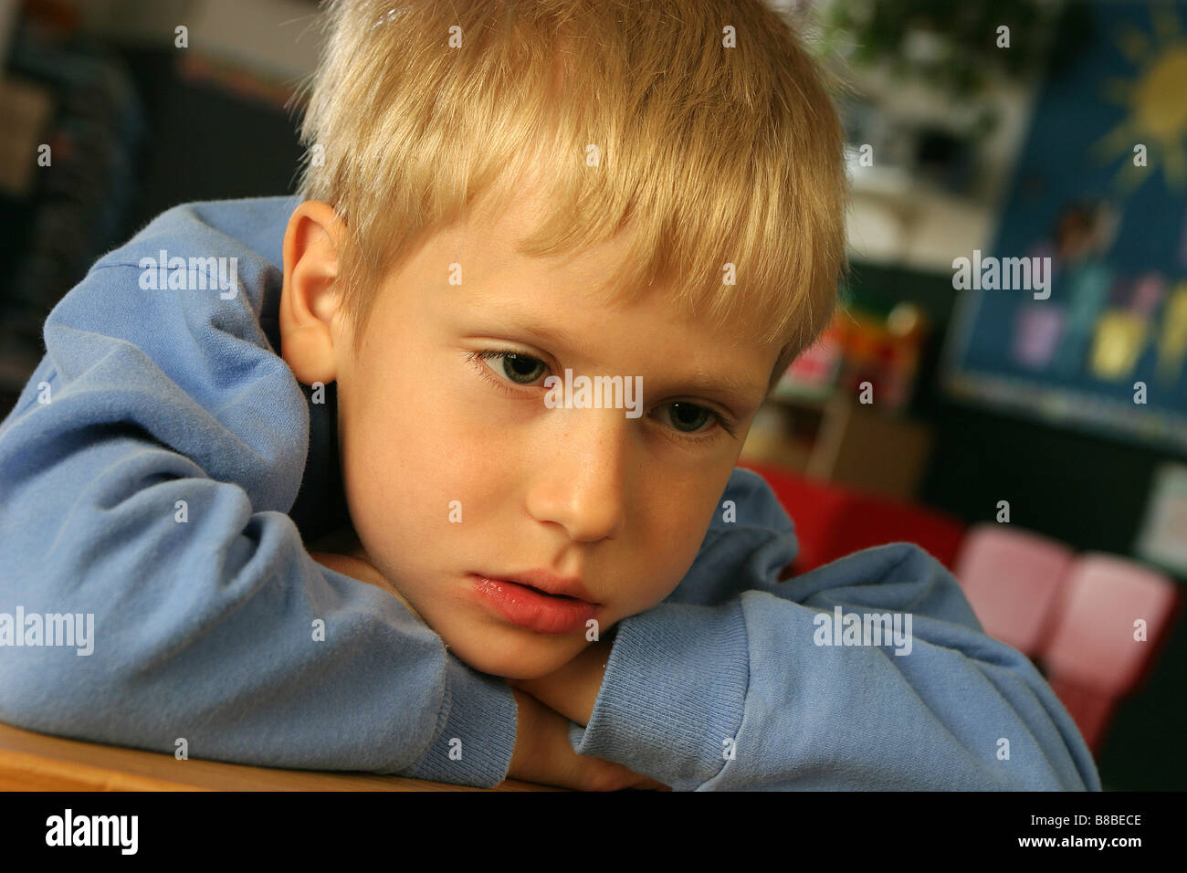 Boy Sitting Desk Stock Photo - Alamy