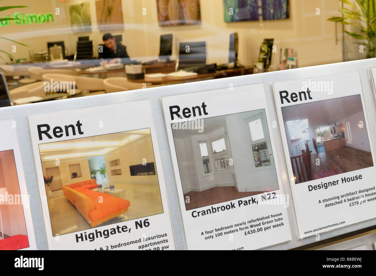 Rental properties displayed in estate agent window London England UK Stock Photo