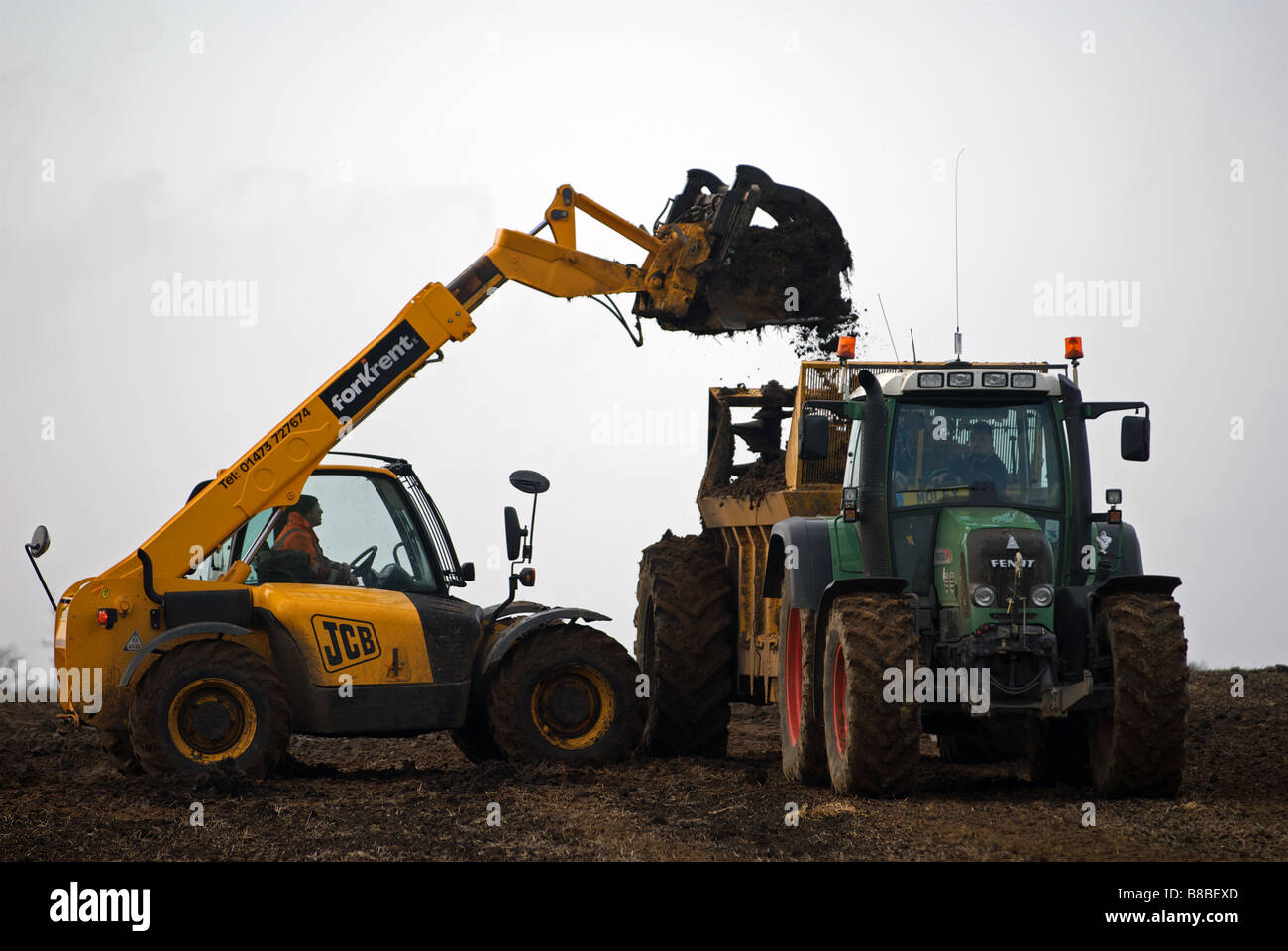Manure spreader tractor hires stock photography and images Alamy