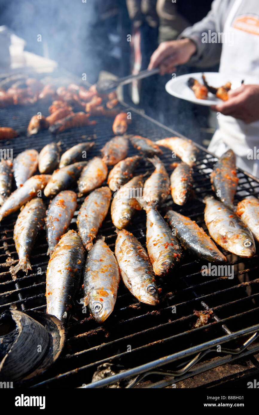 Outdoor BBQ Grilling Sardines, Kensington Market, Toronto Stock Photo