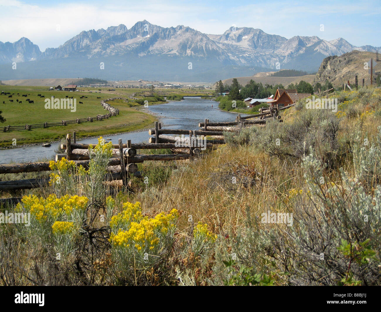 Fence along Edge Salmon River Stanley Sawtooth Mountains background,  Stanley, Idaho Stock Photo - Alamy