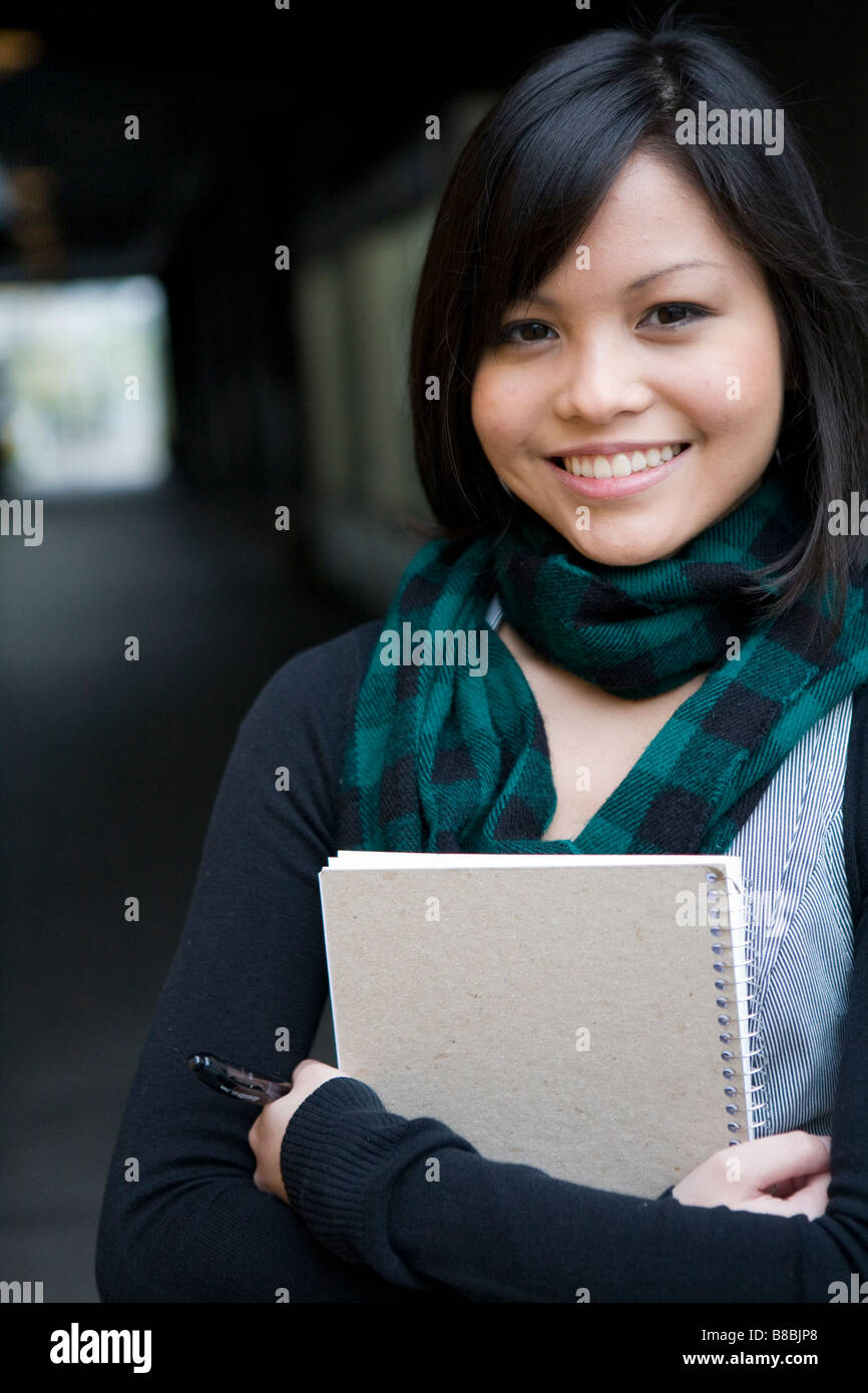 Portrait Teenage Girl Holding Notebook Stock Photo - Alamy