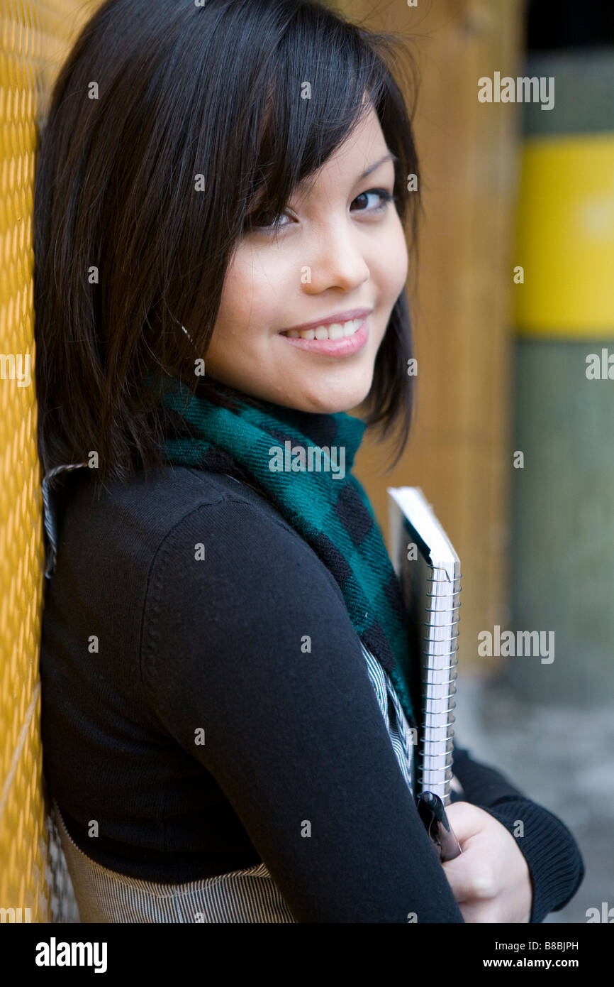 Portrait Teenage Girl Holding Notebook Stock Photo - Alamy