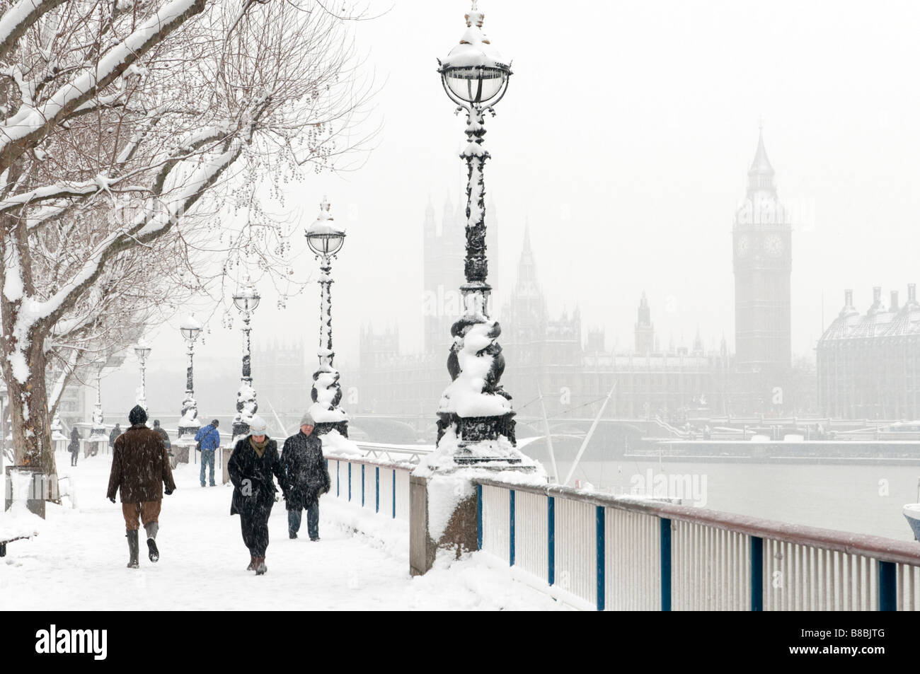 Snow covered Thames riverside in London England UK Stock Photo