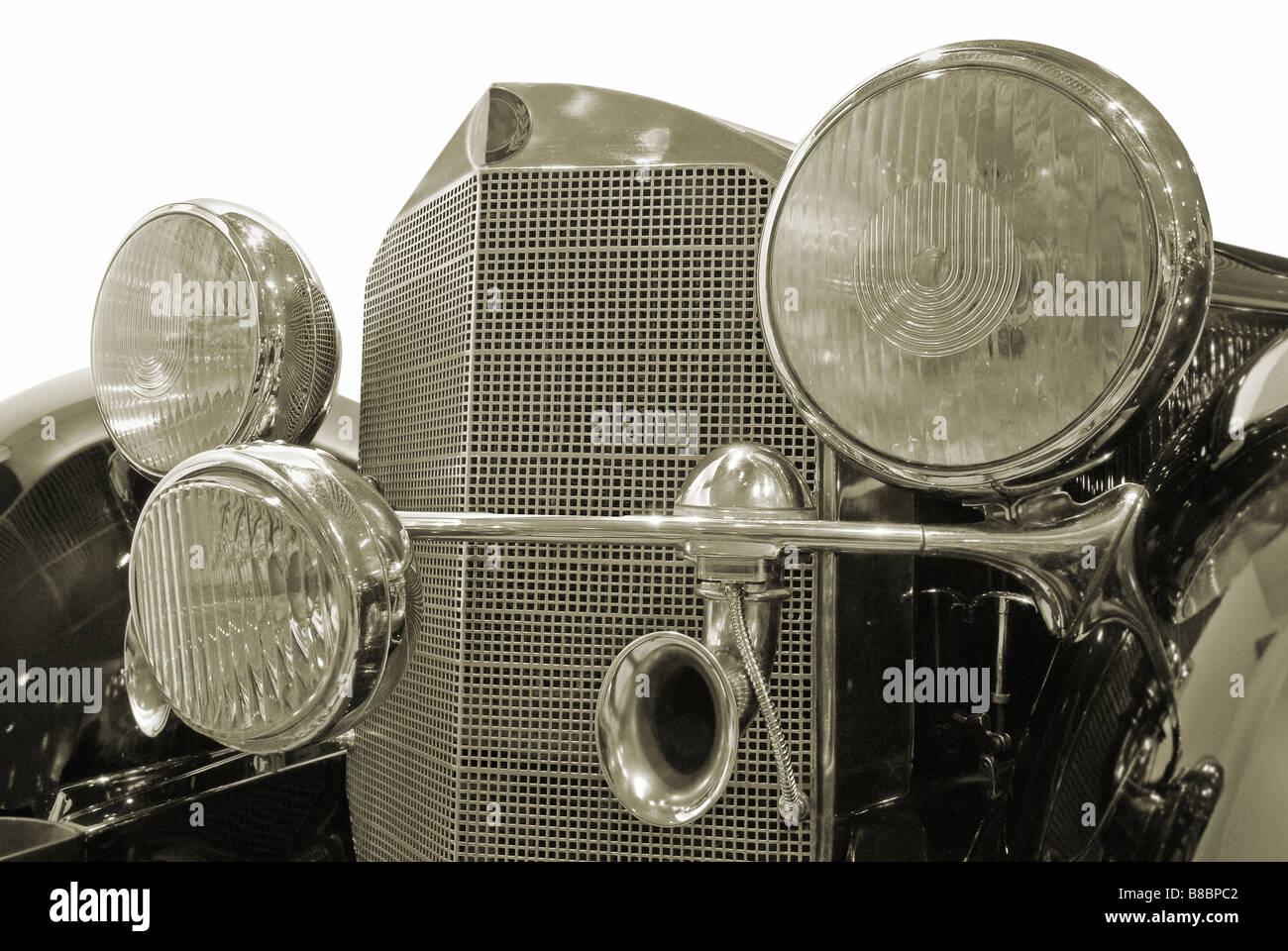 The front of antiquarian car isolated over white with clipping path