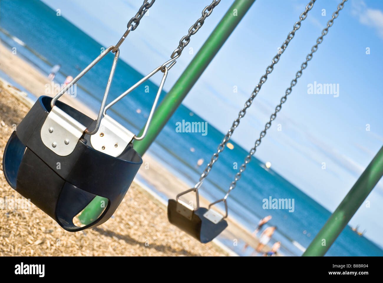 Swings on the Ocean beach Stock Photo Alamy