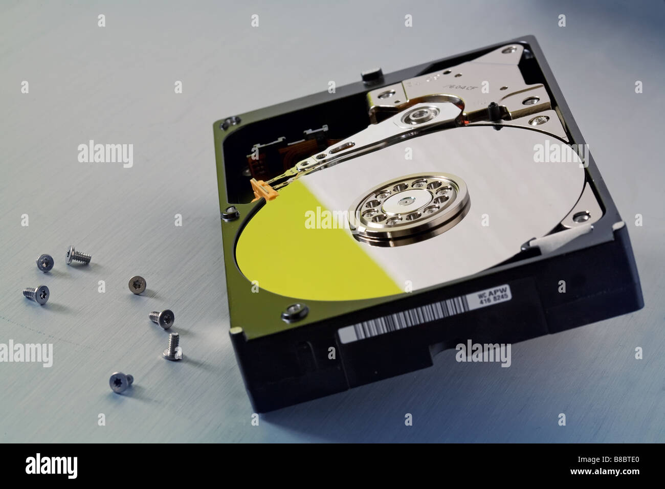 a internal sata hard disk drive with hex screws opened for repairs