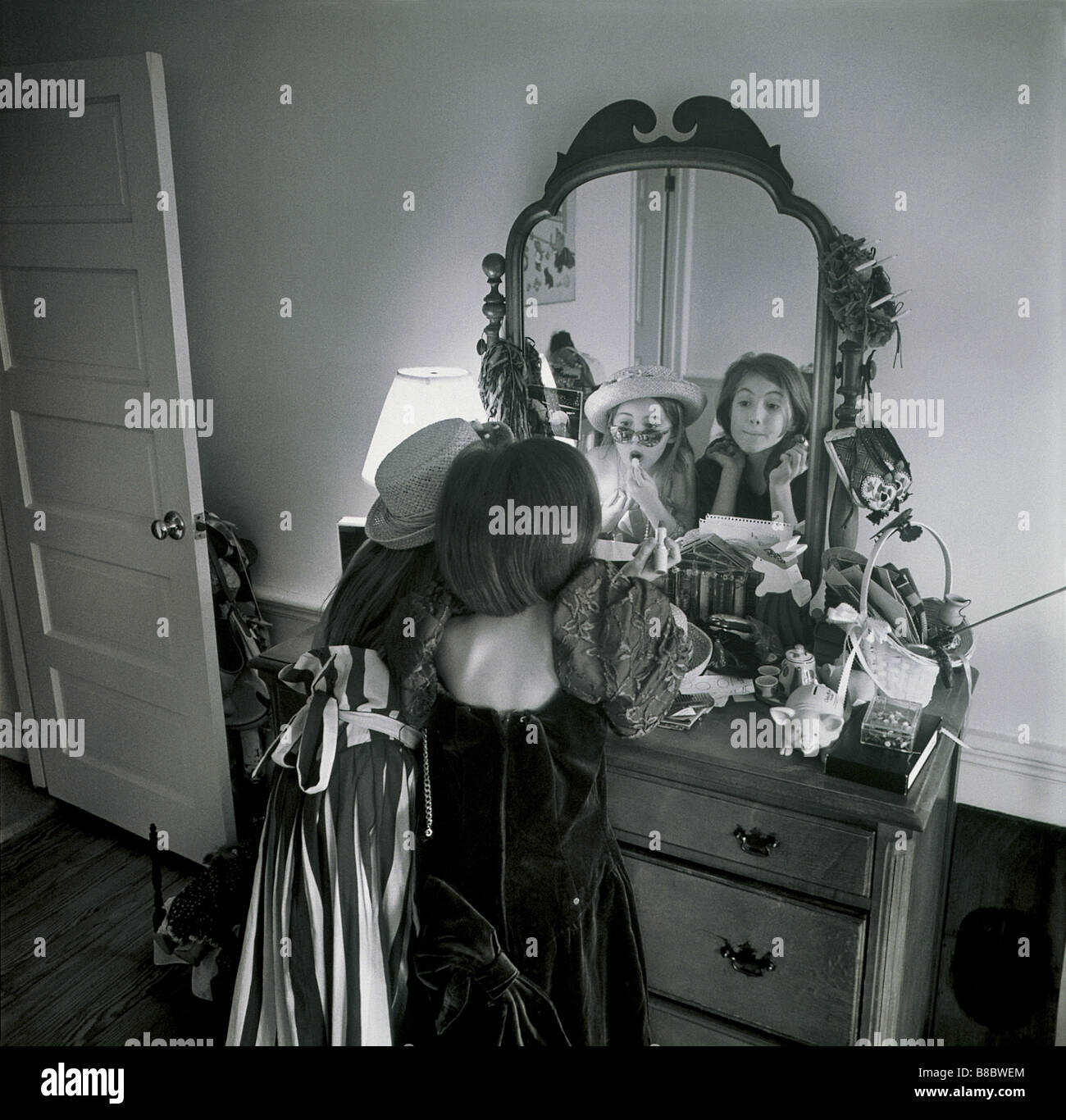 Fl4881 Nick Kelsh Two Young Girls Playing Dress Up Mirror Bw