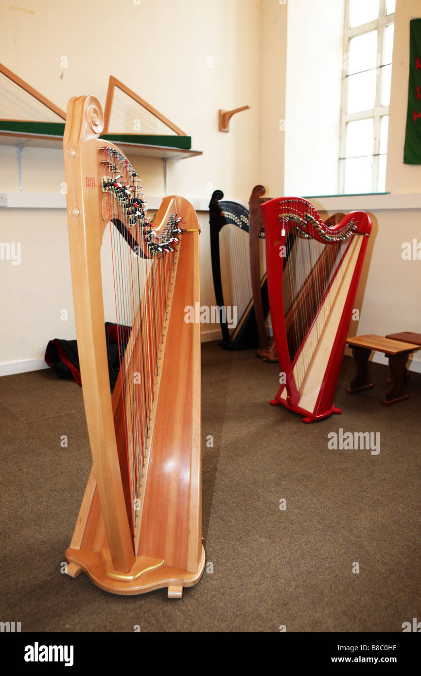 Hand made traditional wooden harps musical instruments hand crafted precision engineering craftsmenship UK Stock Photo