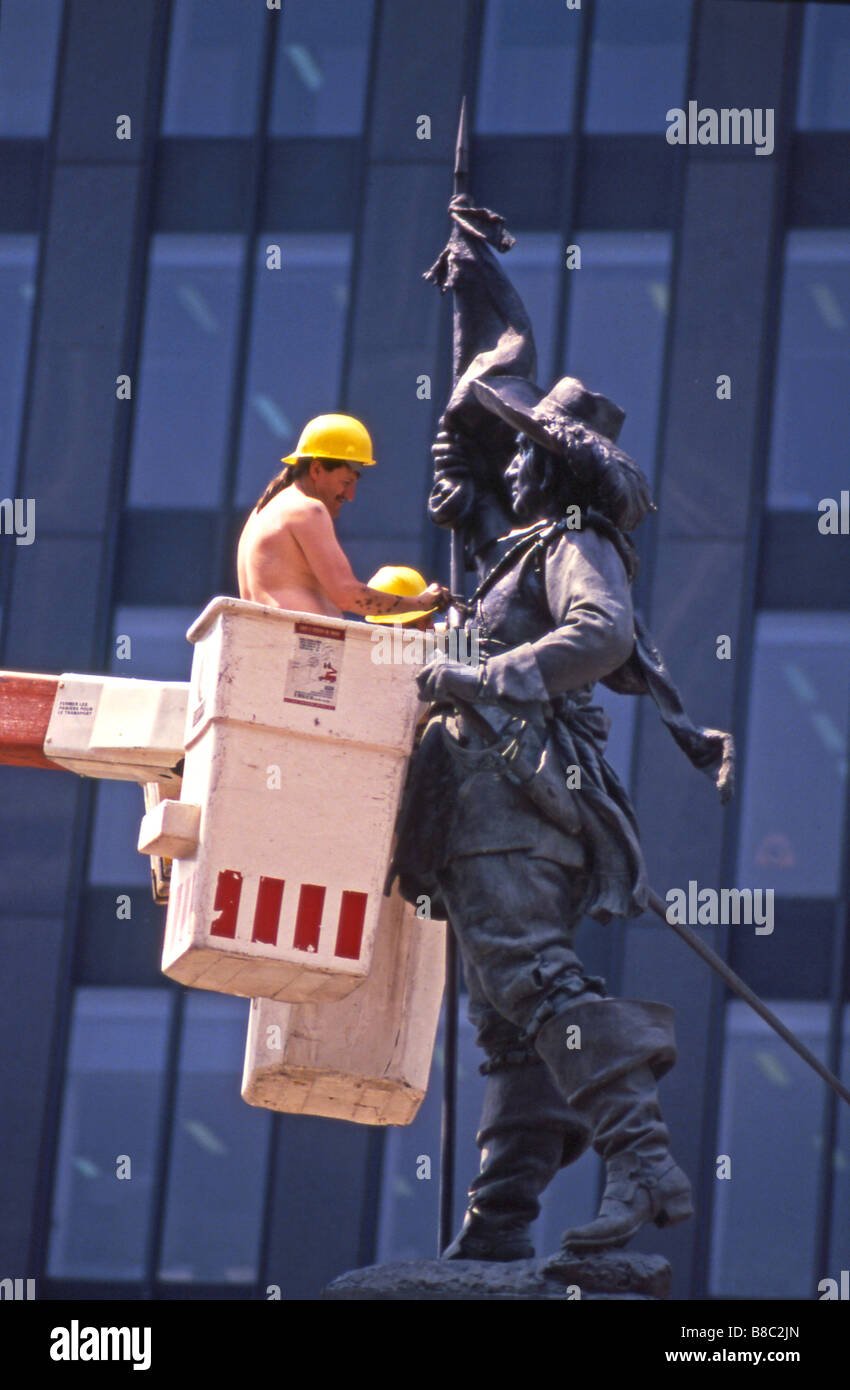 Workers Cleaning Statue, Old Montreal, Quebec Stock Photo - Alamy