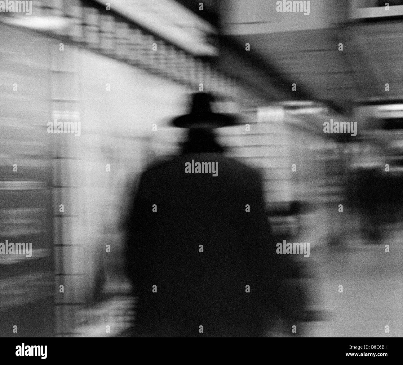 Blurred Image  Person Hat  Coat, B/W Stock Photo