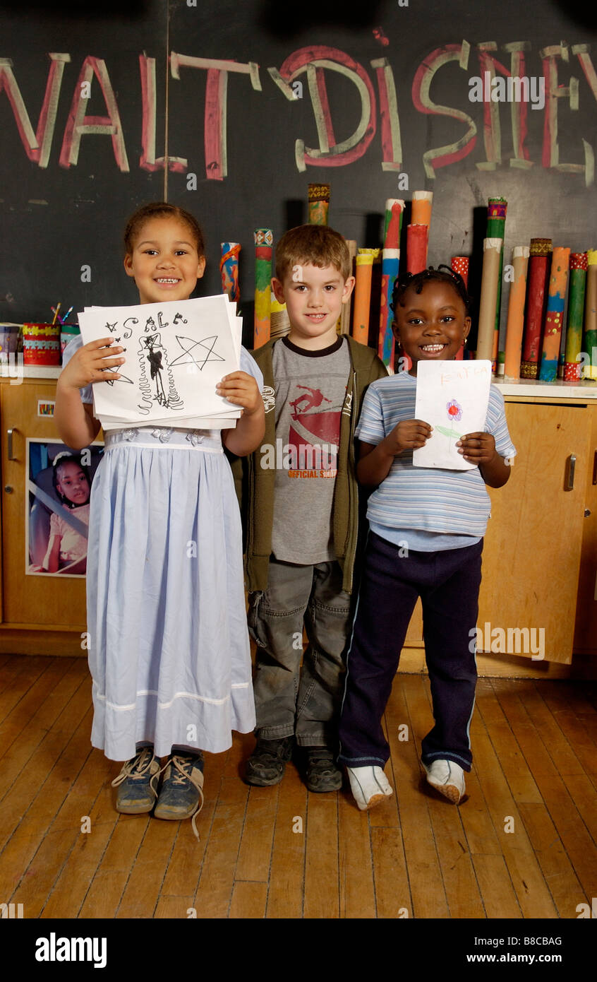 Four to Seven Year Old Kids, showing artwork Classroom Stock Photo
