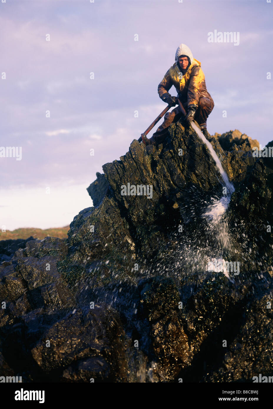 Worker jet washing rocks hi-res stock photography and images - Alamy