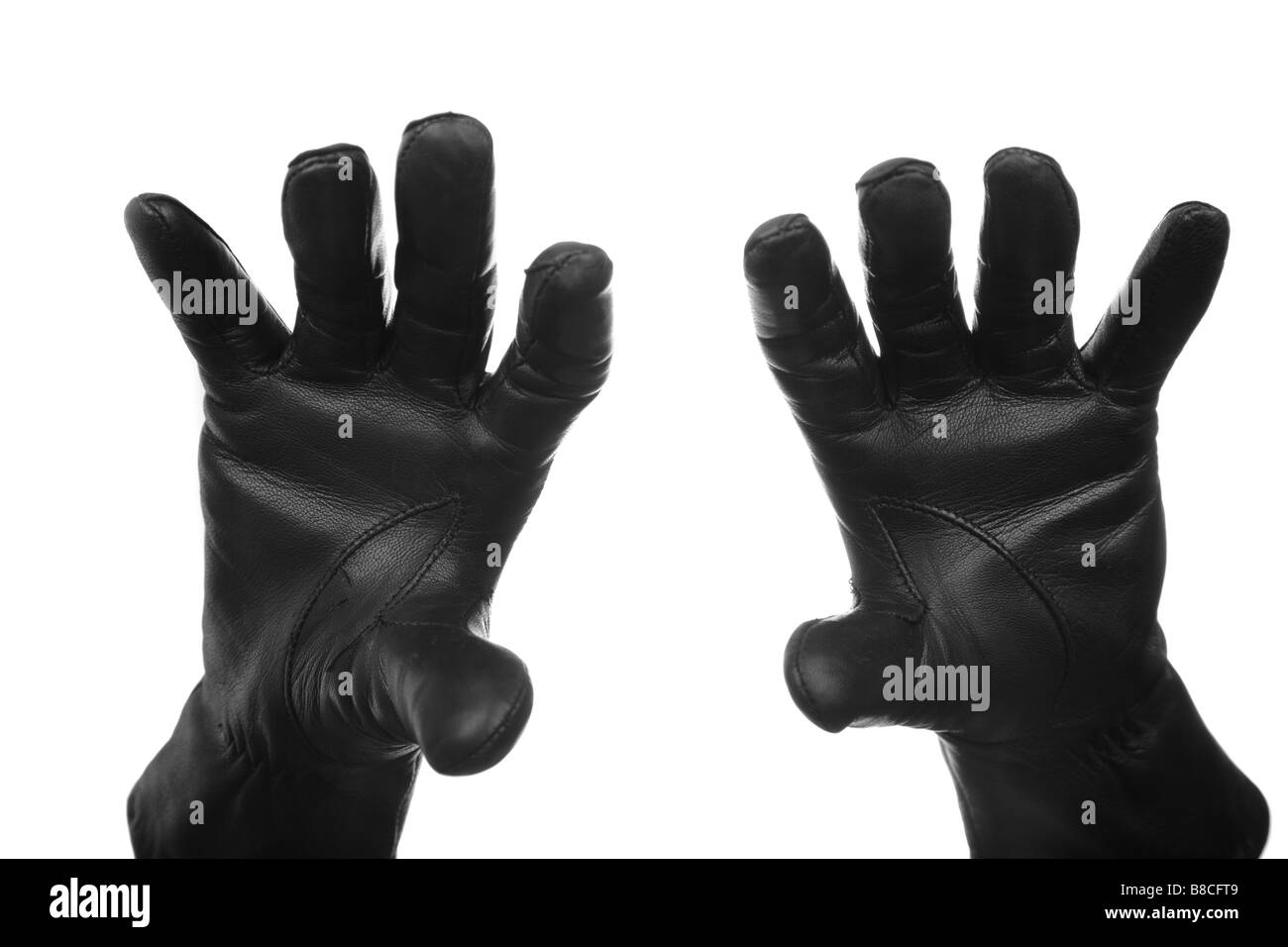 Black leather gloves Black and White Stock Photos & Images Alamy