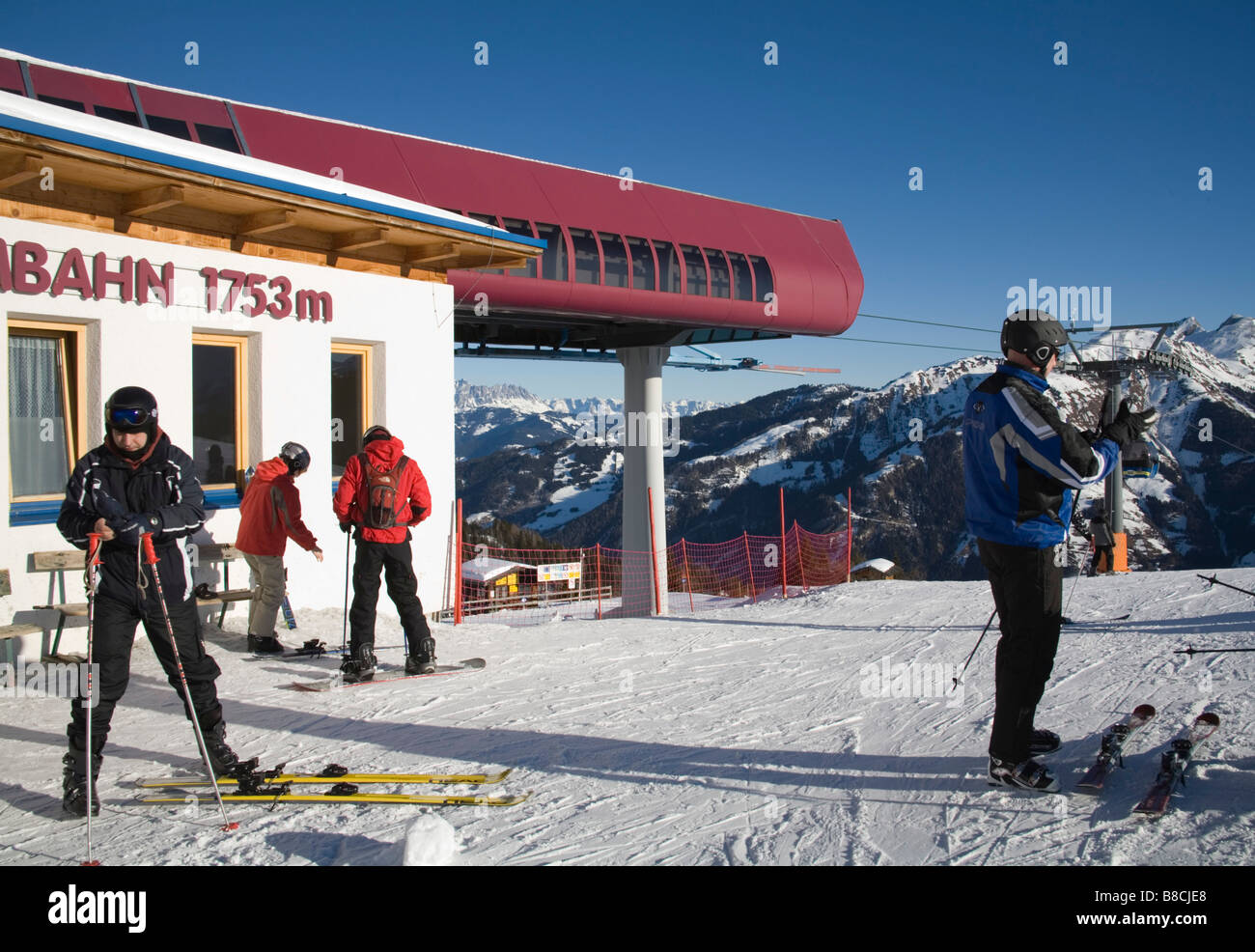 Rauris Austria EU January Skiers at the Hochalmbahn gondola station preparing to descent the ski slopes Stock Photo