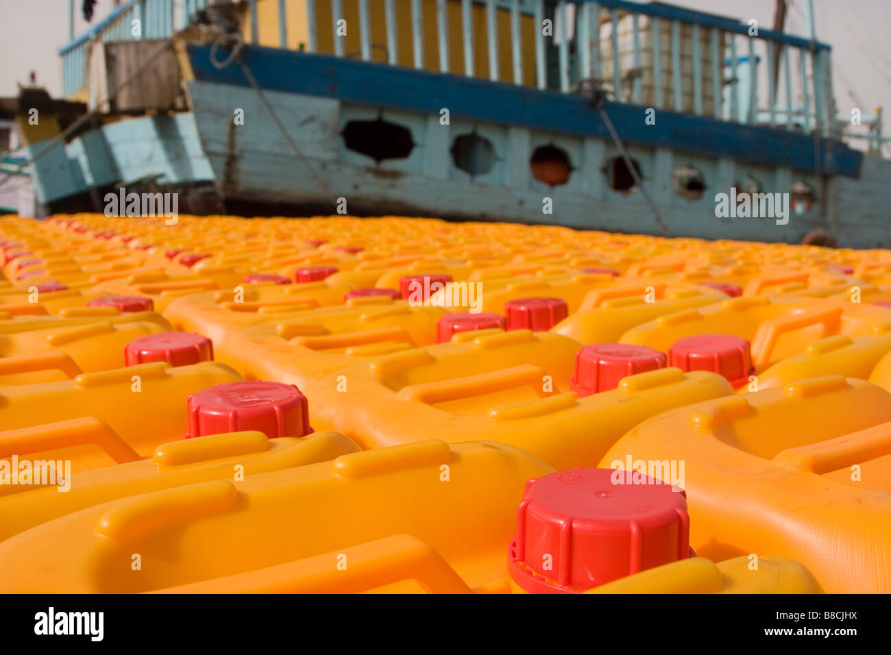 Dubai, UAE, Cooking oil waits to be loaded aboard a dhow headed for