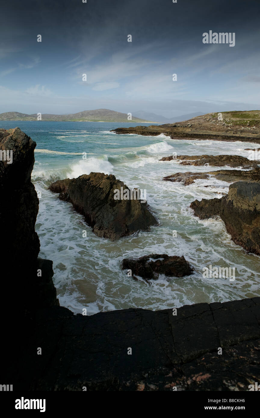 Outer Hebrides Island Harris beach at high tide sand sea and rocks coast shore line in Scotland Stock Photo