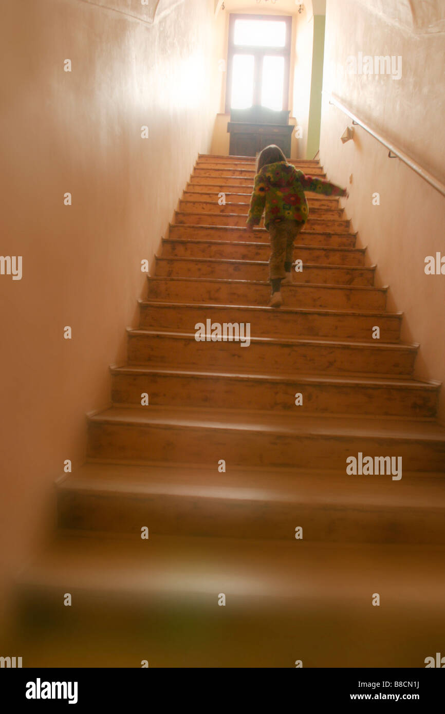 Girl Climbing Stairs Stock Photo Alamy