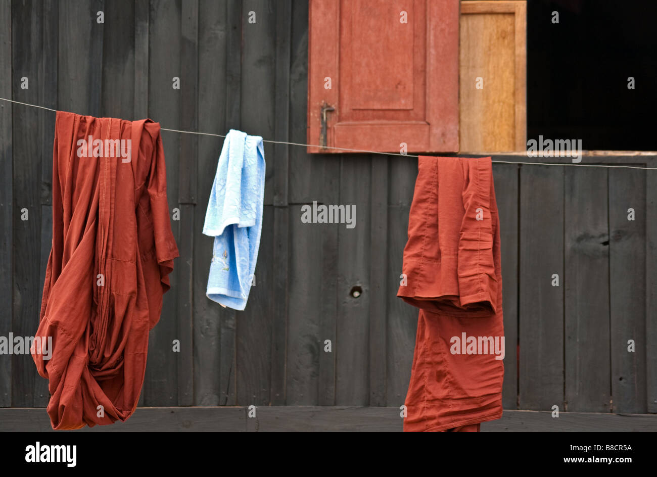Robes of Buddhist monks hanging out to dry at a monastery in Kalaw, Myanmar (Burma) Stock Photo