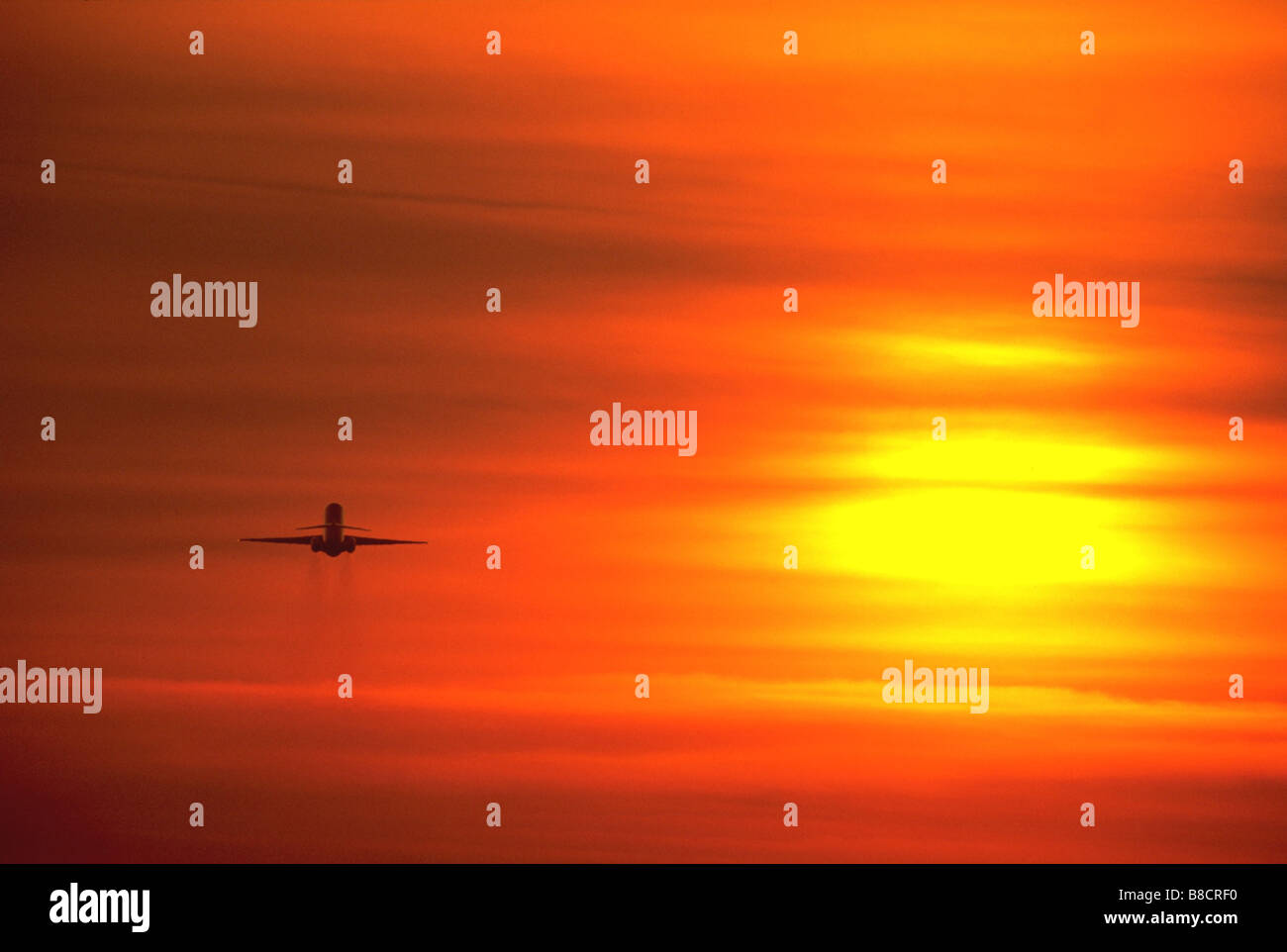 FV0038, Dave Nunuk; Plane orange sky, sunset, DC9 Vancouver Int  Airport Stock Photo