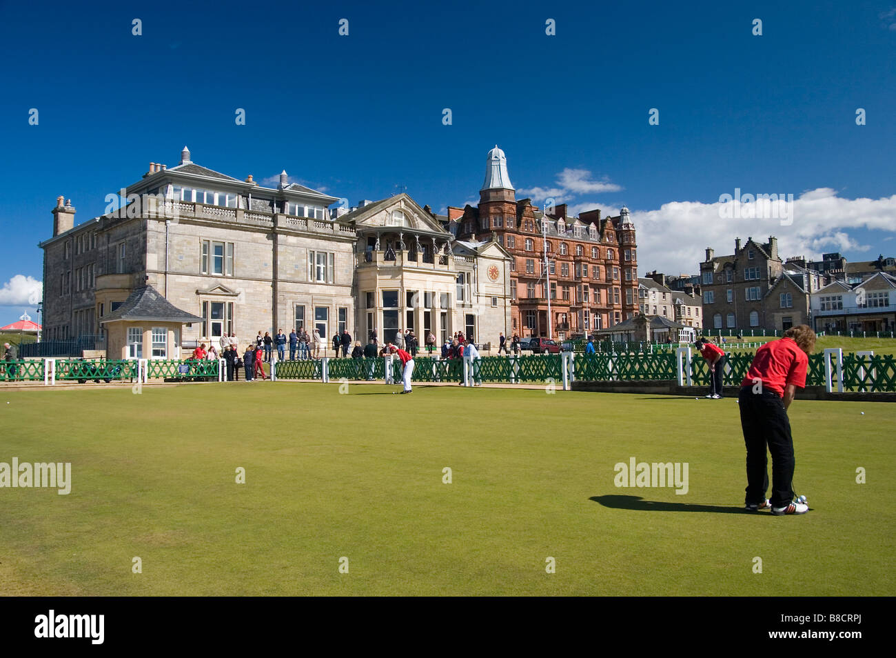 MS4138T Practice green and clubhouse at Old Course St Andrews Fife Scotland Stock Photo