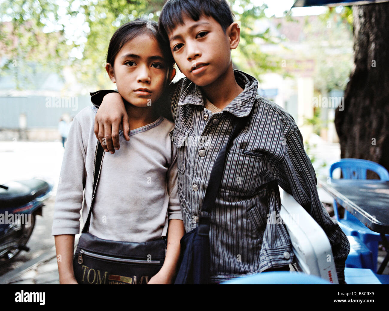 Cambodia children playing with toys,- two girls aged 8-10 years, Phnom  Penh, Cambodia, Asia Stock Photo - Alamy