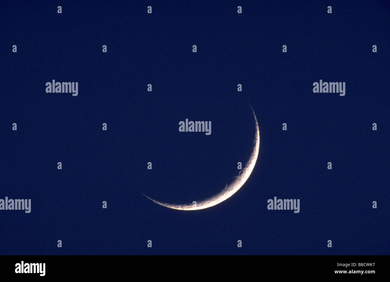 FV1063, Dave Nunuk; Crescent moon, blue sky Stock Photo