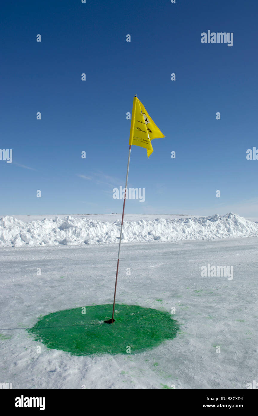 Golf Flag  Hole Green Ice, Cambridge Bay, Nunavut Stock Photo