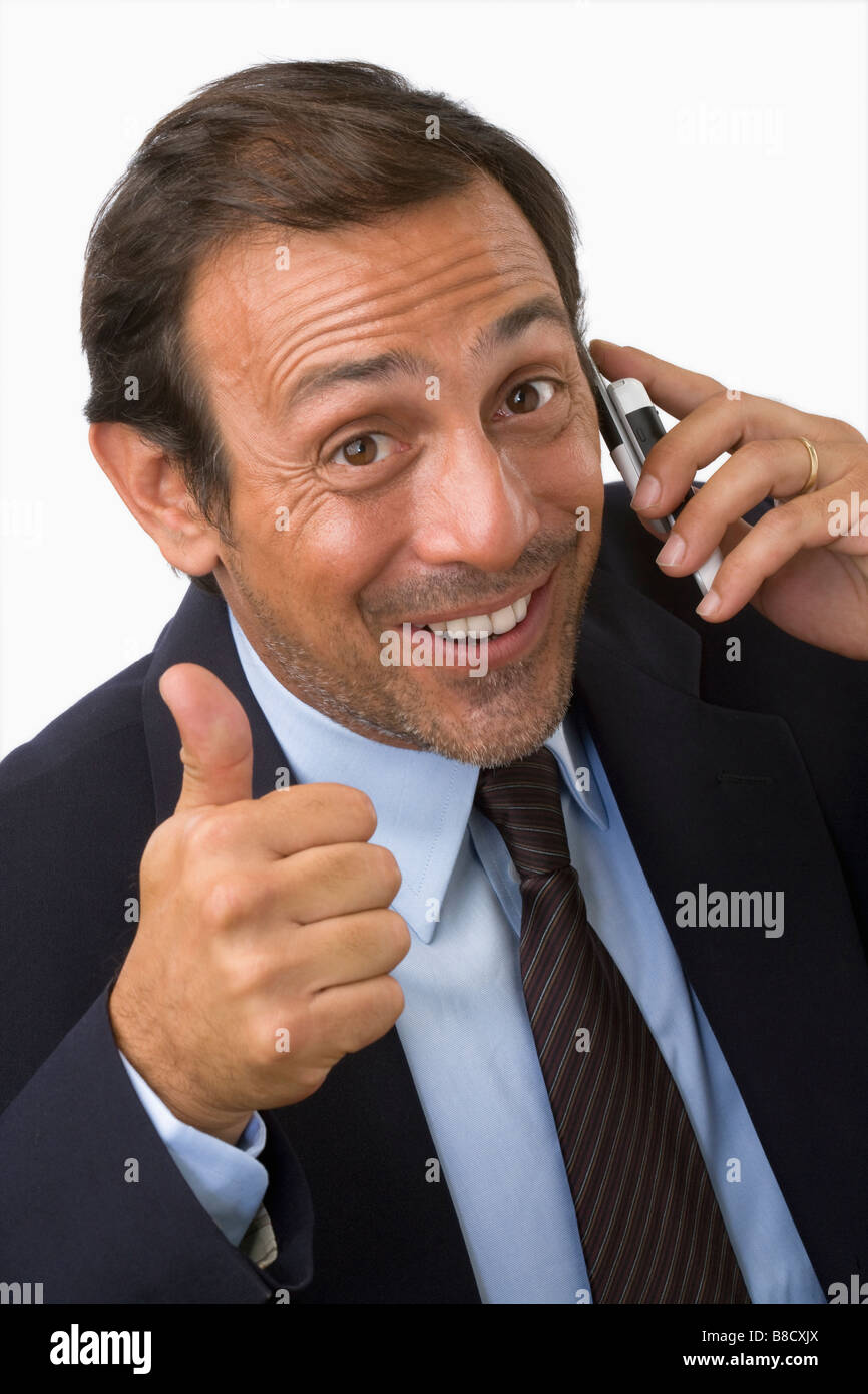 Man Talking On Cell Phone With Thumbs Up Stock Photo Alamy