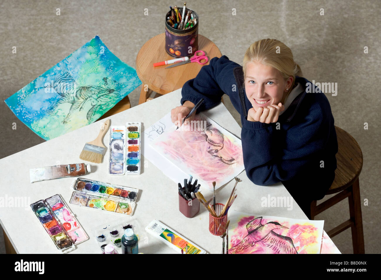 Female high school student in an art class Stock Photo - Alamy
