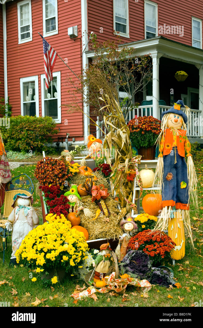 Autumn Yard Decor With Pumpkins Corn Stalks And Scarecrows At The