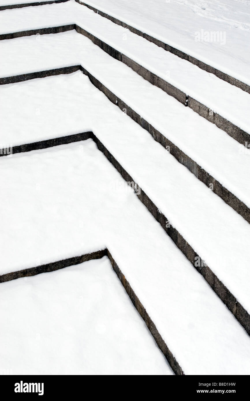 Detail view of street stairs covered with snow. Stock Photo