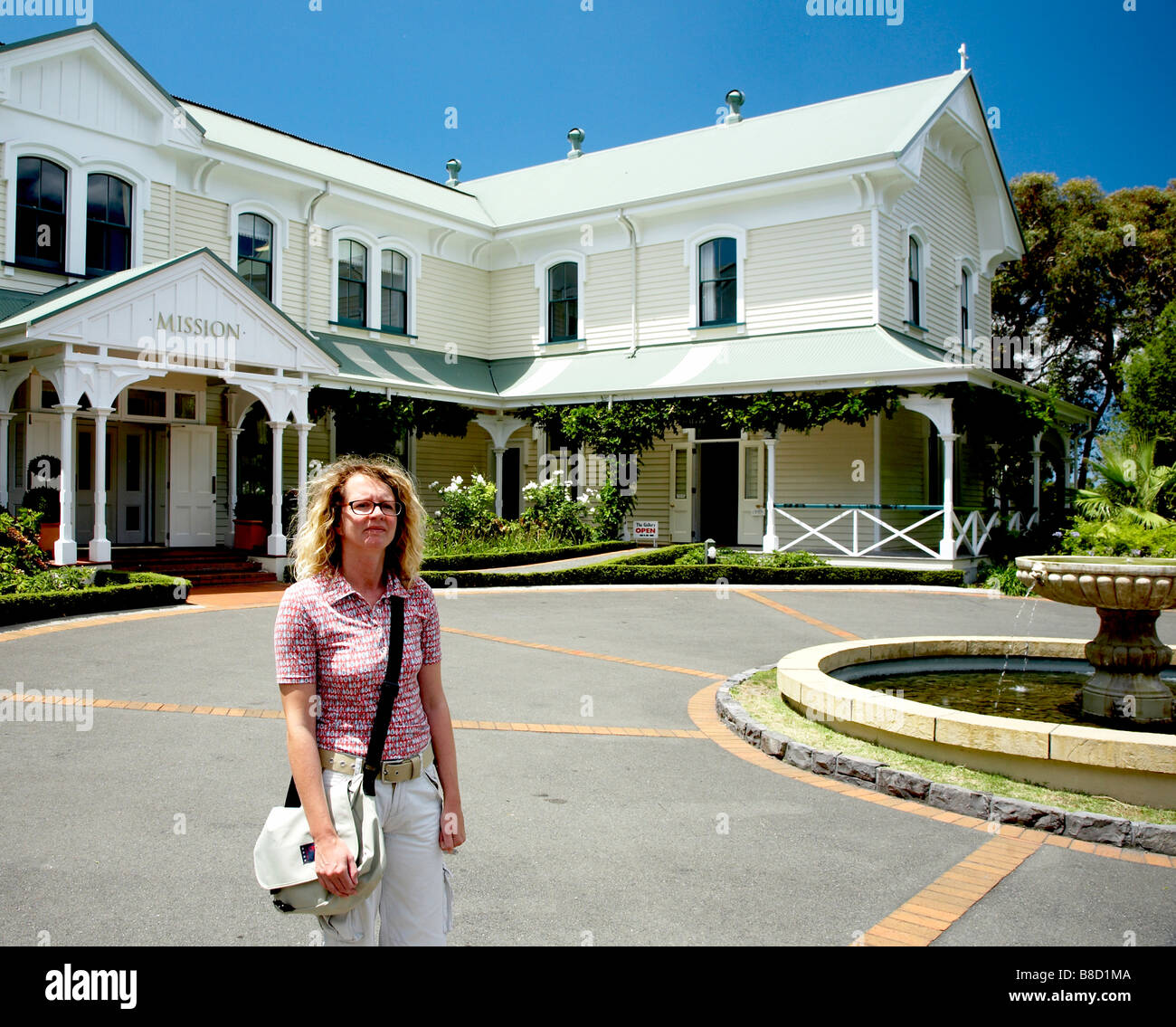 woman outside mission winery in hawkes bay new zealand Stock Photo