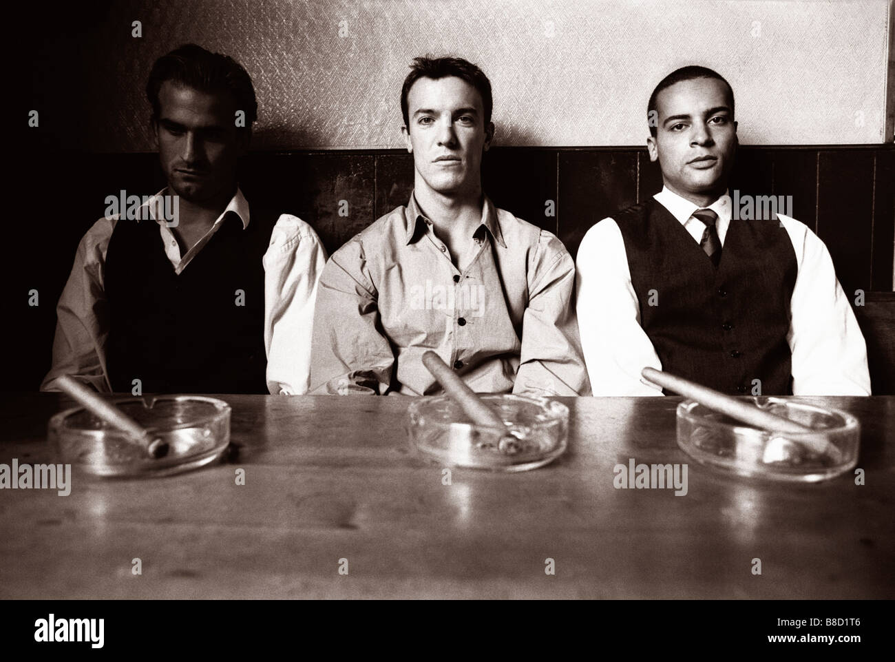 FV3003, Malek Chamoun; 3 Men  Table Stock Photo