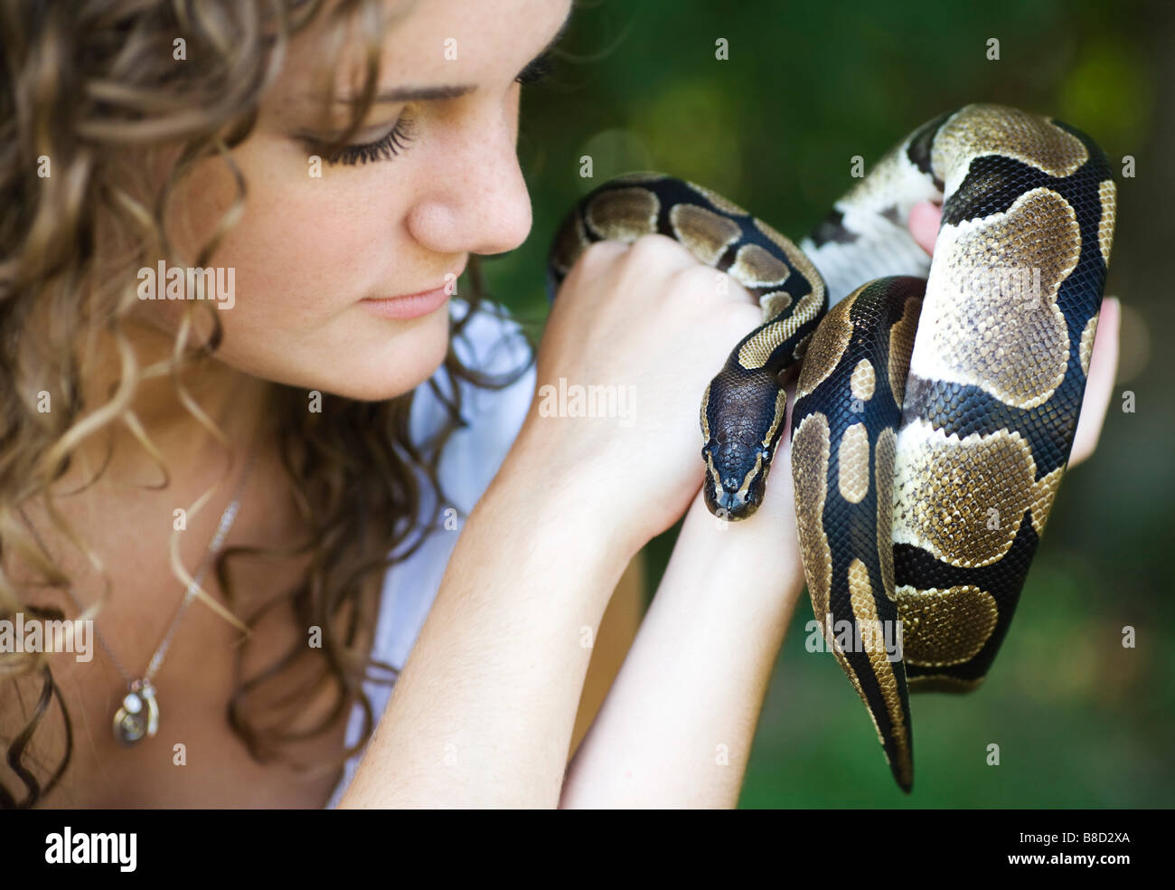 Woman with a snake Stock Photo Alamy