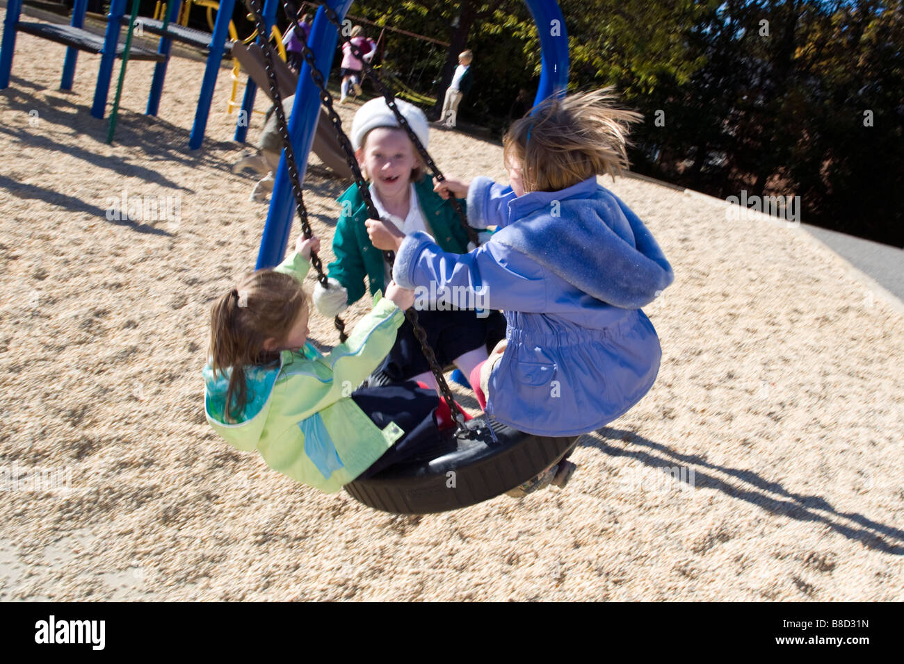 childchildren Group children tire swing hi-res stock photography and images - Alamy