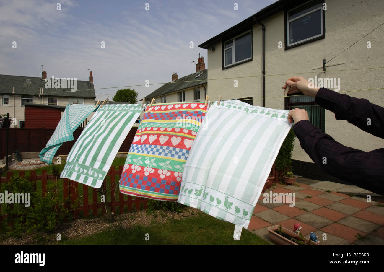 Kitchen Towels Hanging On A Washing Line In A Garden Stock Photo