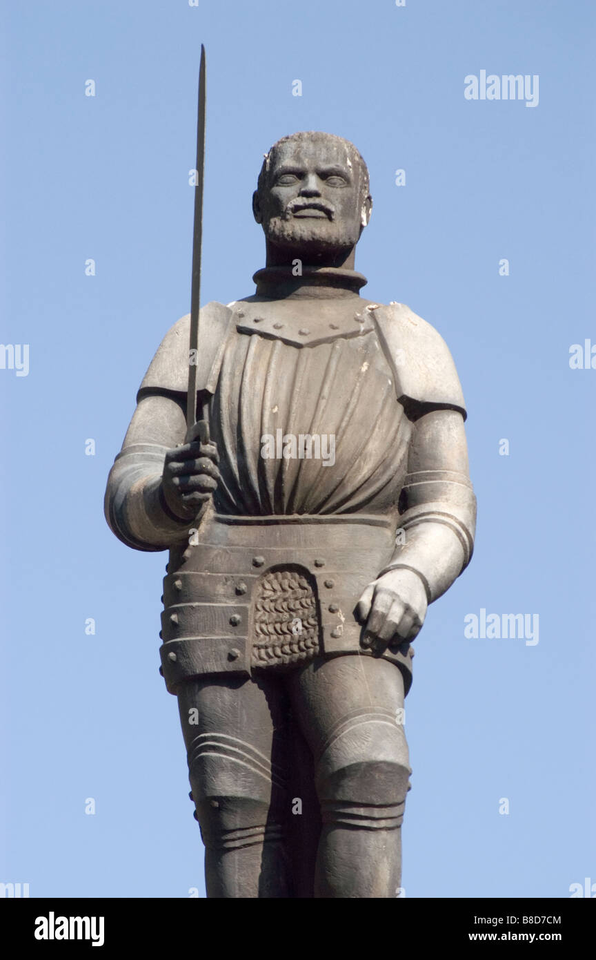 Man with sword statue on whipping post, pillory, Old Market Square, Poznan, Poland Stock Photo