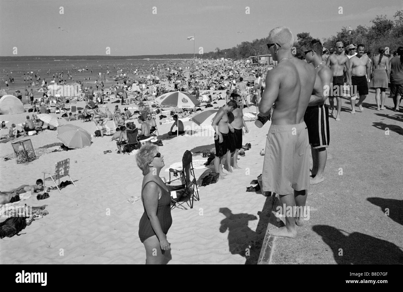 Crowded beach Black and White Stock Photos & Images - Alamy