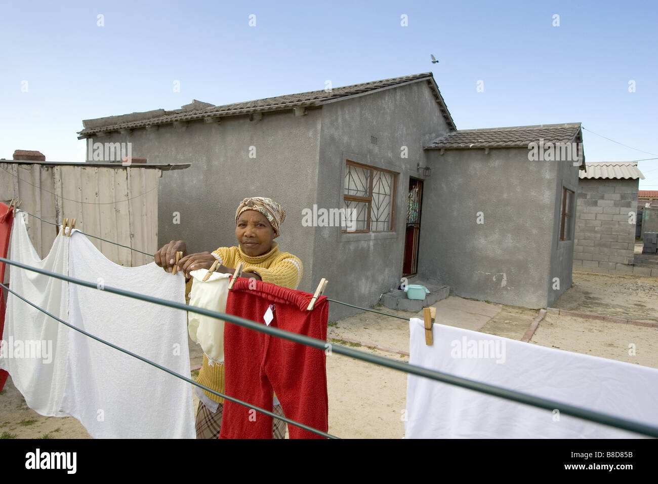Woman Hanging Laundry, Khayelitsha Town Ship, Cape Town, South Africa