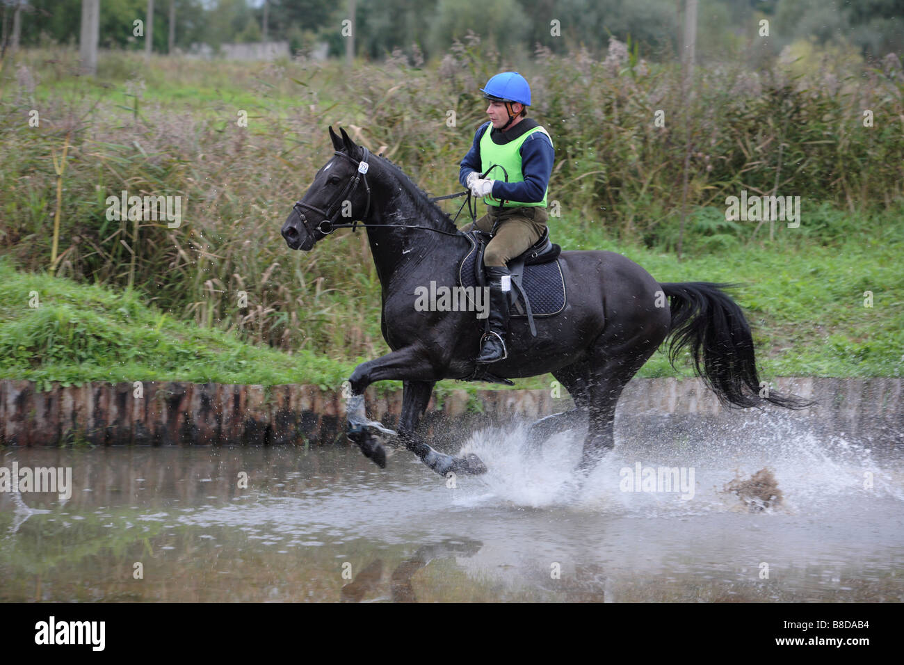 Three Day Event Rider Taking part in the Cross Country Phase at the ...